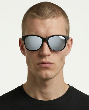 Delta 9 oversized round sunglasses in Grey / Black, grey lens on black frame, worn by a man, front view