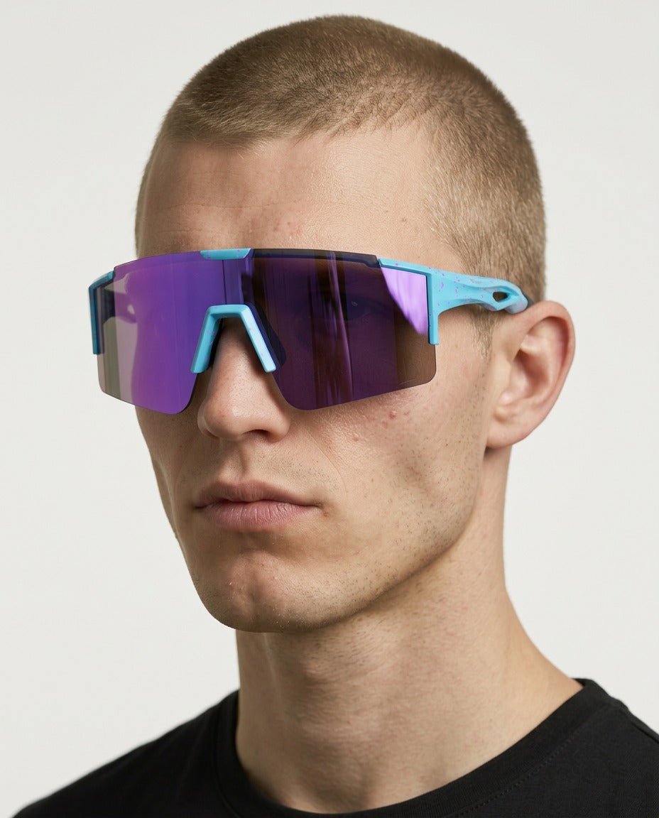 Dial Up sport shield sunglasses in Purple / White, purple lens on white frame, worn by a man, front view
