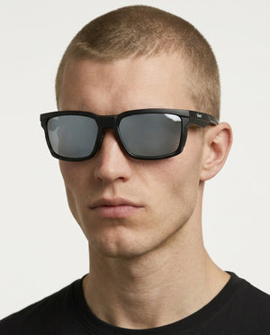 Flux sport wrap sunglasses in Grey / Black, grey lens on black frame, worn by a man, front view