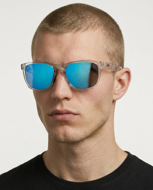 Marlow square sunglasses in Blue / Clear, blue lens on clear frame, worn by a man, front view