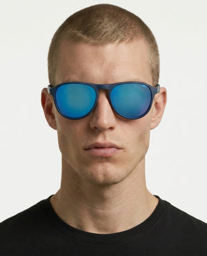 Orbit rounded aviator sunglasses in Blue / Blue, blue lens on blue frame, worn by a man, front view