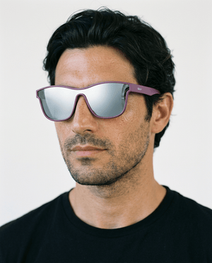 Radar performance wrap sunglasses in Silver / Purple, silver lens on purple frame, worn by a man, front view