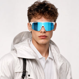 Rialto one-piece shield sunglasses in Blue / White, blue lens on white frame, worn by a man, front view